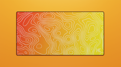 Full view of the Amber Topography Deskmat showing a smooth orange-to-gold gradient with white topographic contour lines and hemmed edges.
