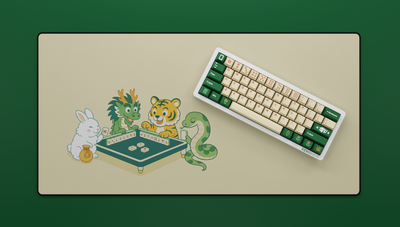 Mahjong Collection featuring the Zodiac Mahjong Deskmat and matching mahjong-inspired keycap set in cream and green tones.