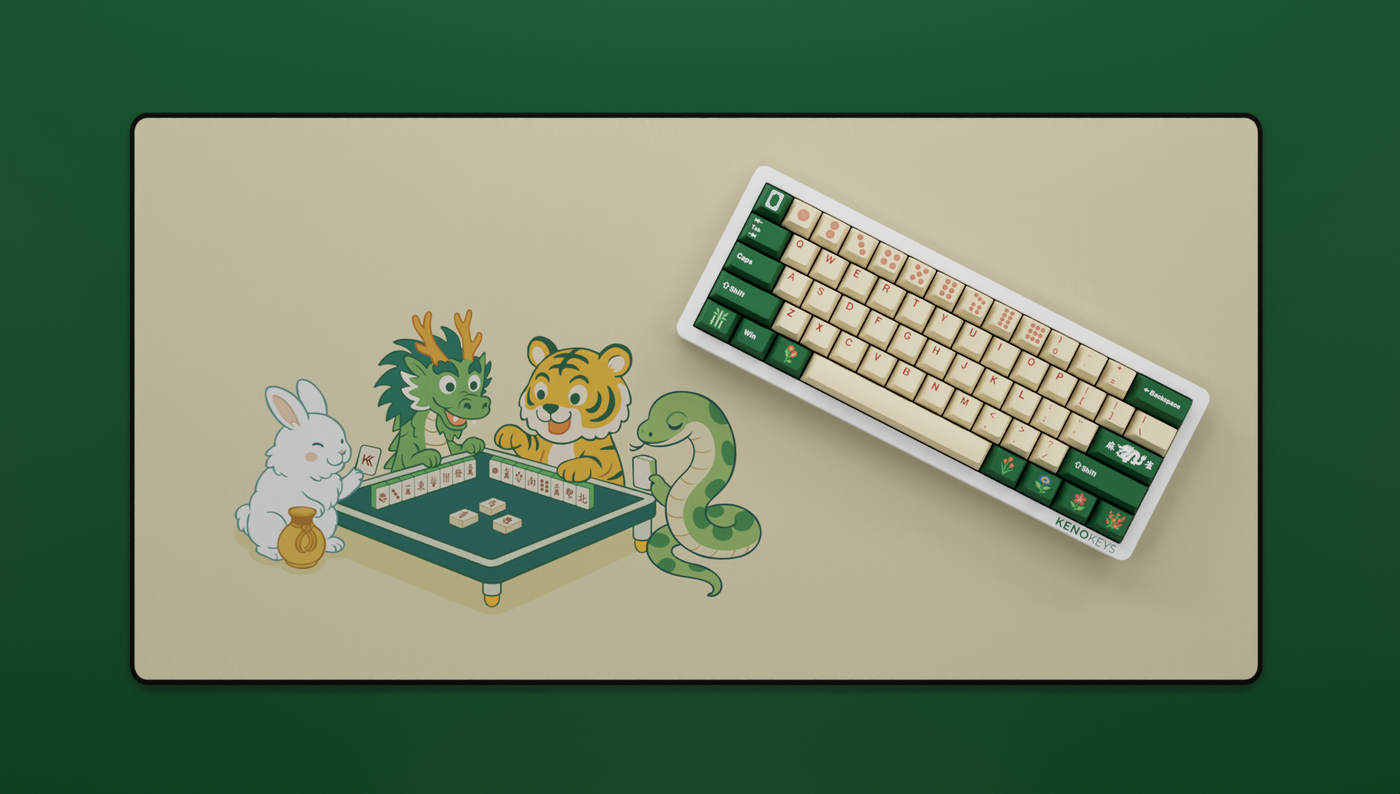 Mahjong Keycap Set on a 60% keyboard with matching green deskmat, featuring ivory alphas and mahjong-themed novelties for an elegant, cohesive setup.