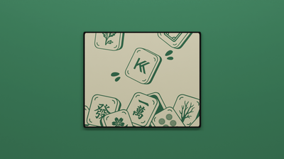 Full view of the Mahjong Mini Mousepad featuring green mahjong tiles with floral, character, and Kenokeys logo details on a beige background.