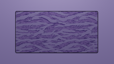 Full view of the Purple Tiger Camo Deskmat showing purple and black tiger stripe camouflage with hemmed edges.