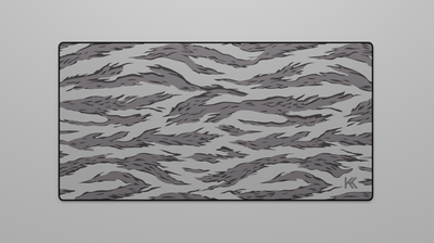 Full view of the Winter Tiger Camo Deskmat showing varying grey tiger stripe camouflage with hemmed edges.