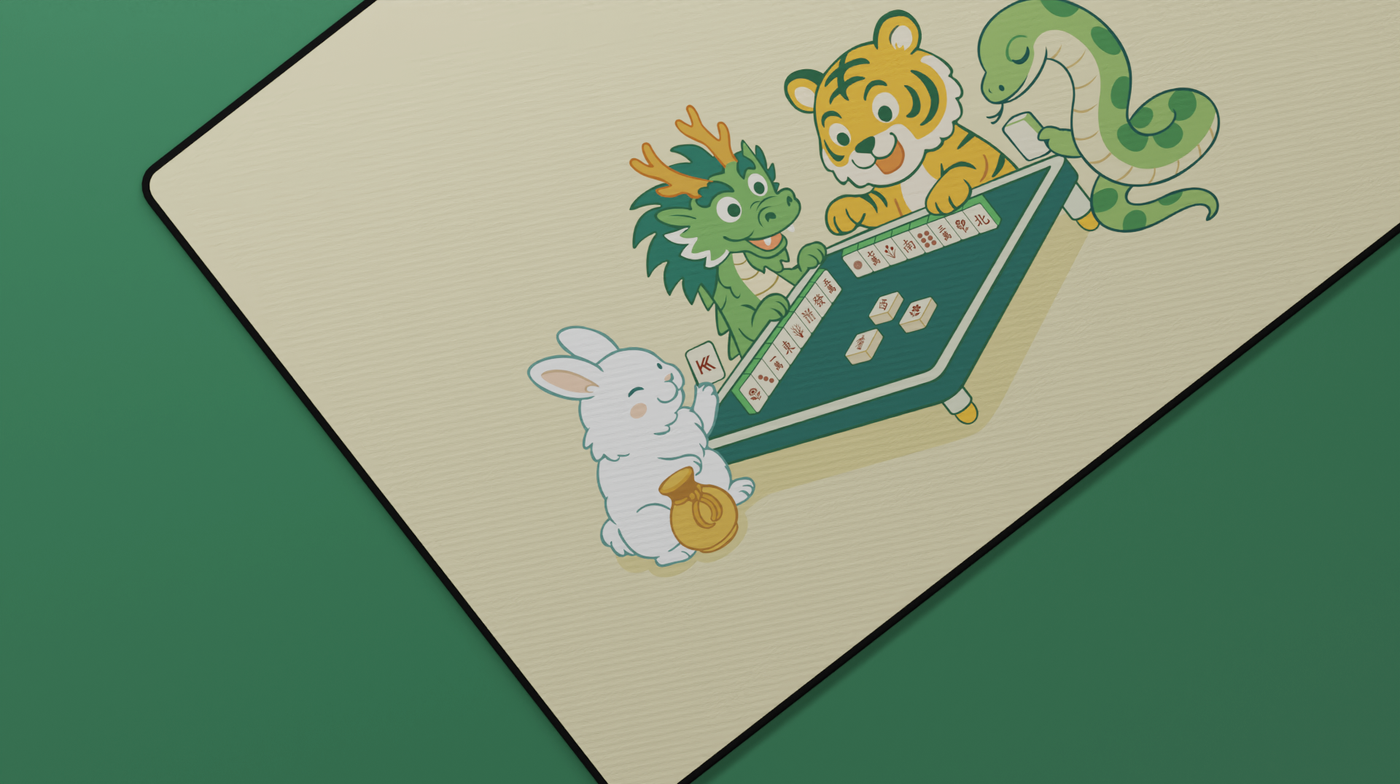 Close-up of the left side of the Zodiac Mahjong Deskmat showing the rabbit and dragon characters with soft stitching and detailed tile art.